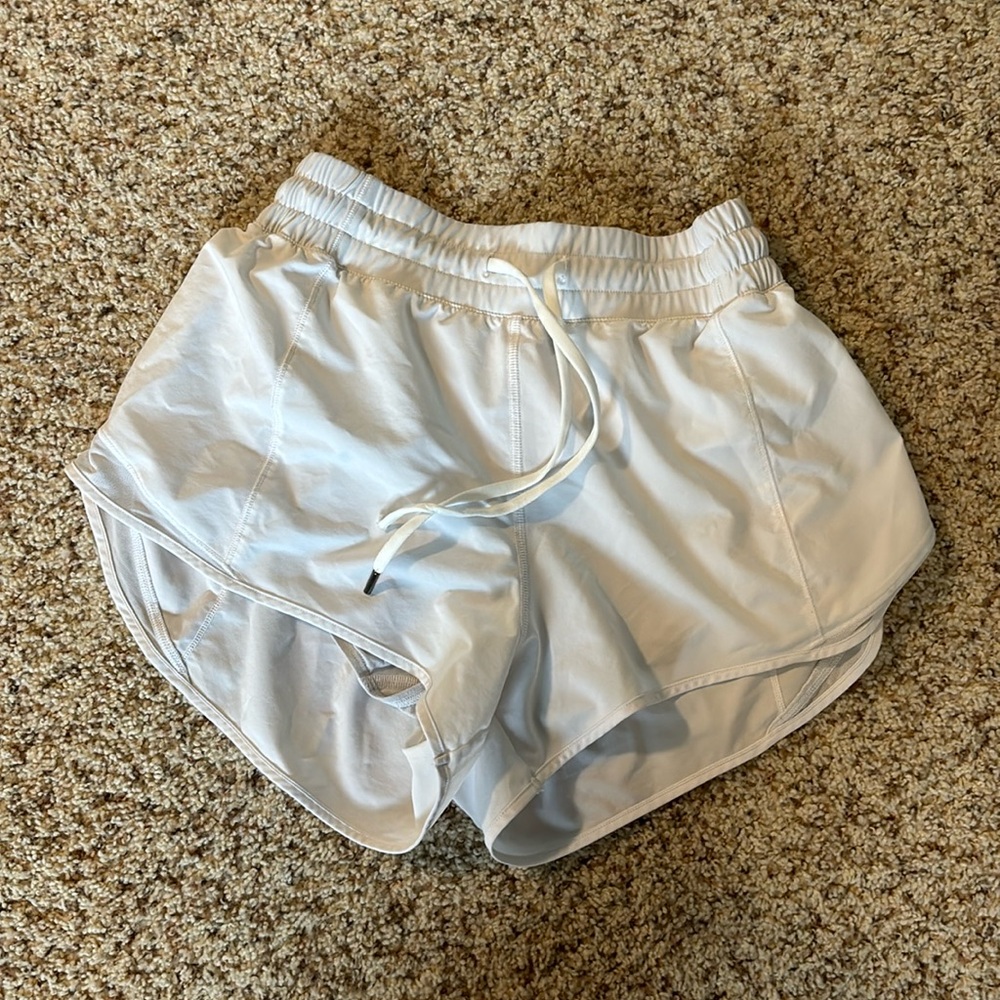 White running shorts. 4”